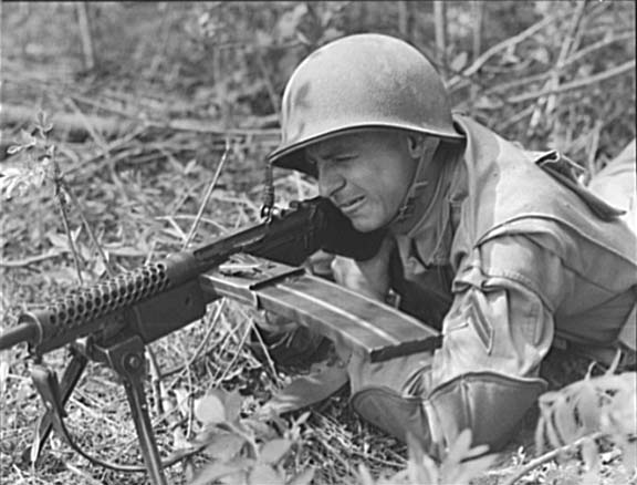 Soldier aiming an M1941 Johnson light machine gun
