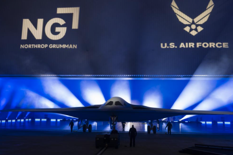 Northrop Grumman B-21 Raider parked on a stage