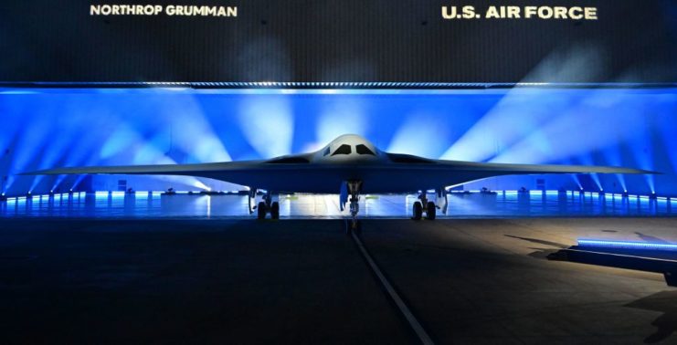 Northrop Grumman B-21 Raider parked on a stage