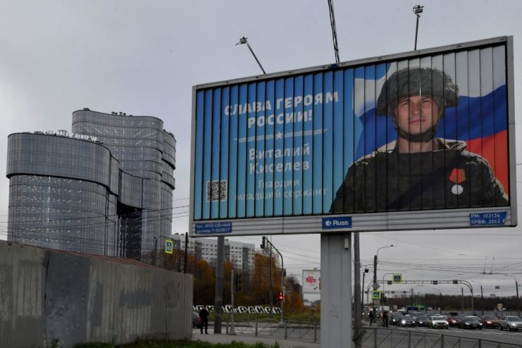 Billboard featuring an image of a Russian soldier