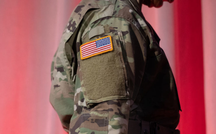 American flag patch on the arm of a US Army soldier's uniform