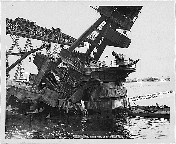 USS Arizona (BB-39) half-sunken in the water