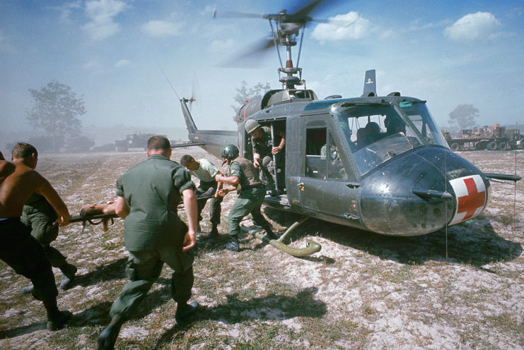 Wounded American soldier being evacuated via helicopter