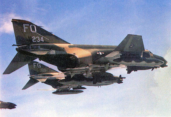 Two McDonnell Douglas F-4D Phantom IIs in flight