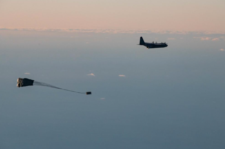 Rapid Dragon Palletized Weapon System being dropped from a Lockheed MC-130J