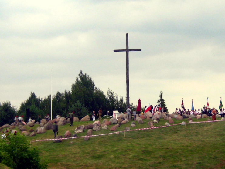 Visitors paying tribute at the memorial dedicated to the victims of the Augustów Roundup