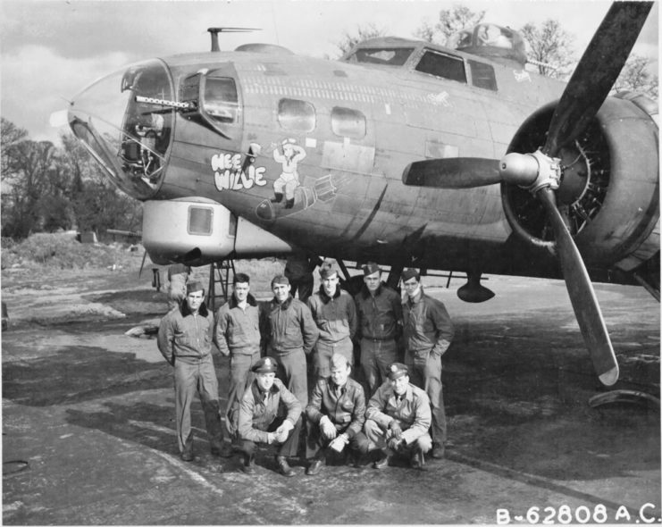 Crew of the Boeing B-17G Flying Fortress 'Wee Willie' standing near the aircraft