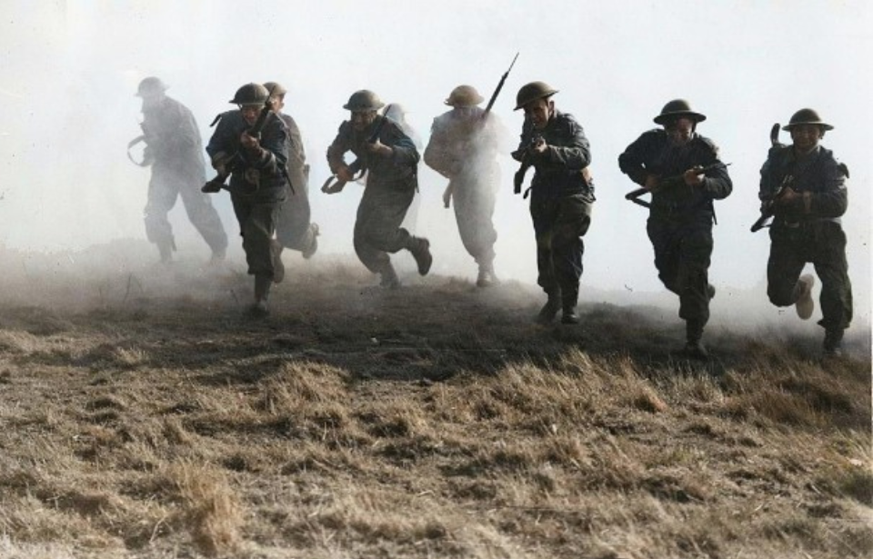 British Royal Marines running through heavy fog