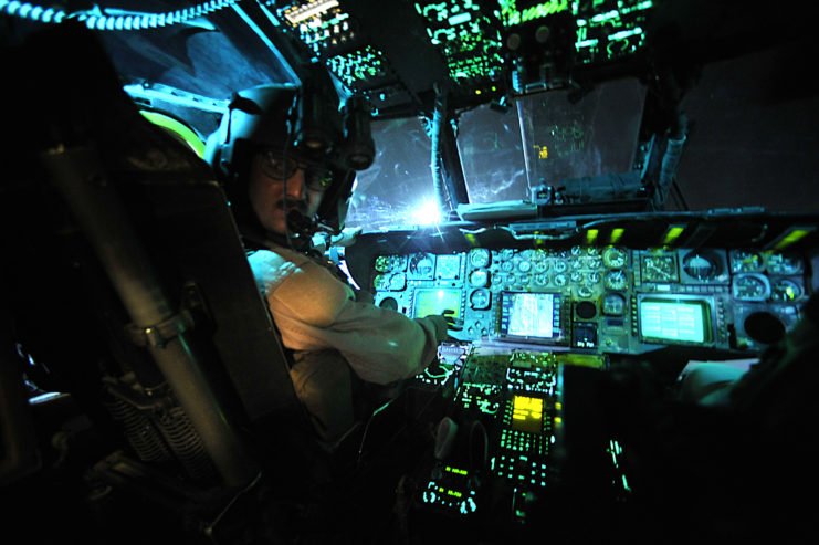 Pilot sitting in the cockpit of a Sikorsky MH-53 Pave Low