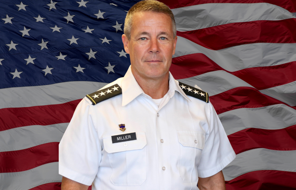 Military portrait of General Austin Miller + American flag