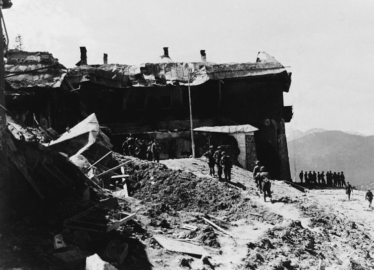 American and French troops walking around the exterior of the Eagle's Nest