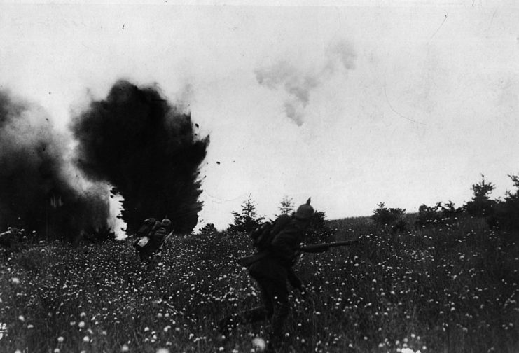 German soldiers advancing through explosions during the Battle of Tannenberg