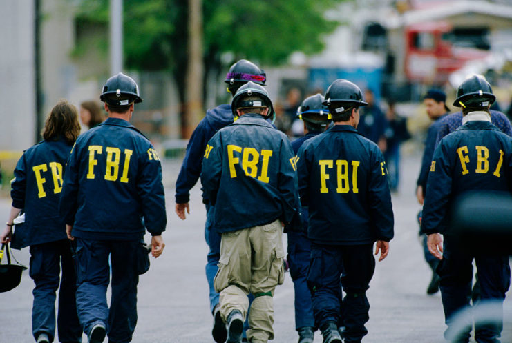 FBI agents walking down a street