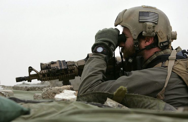 US Navy SEAL looking through binoculars