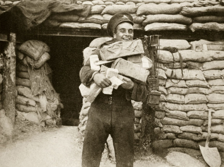Soldier carrying packages and letters