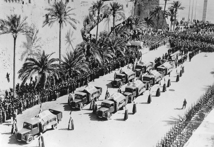 Aerial view of a funeral procession in the Libyan desert