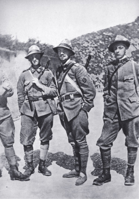 Italo Balbo standing with his comrades in a mountainous area