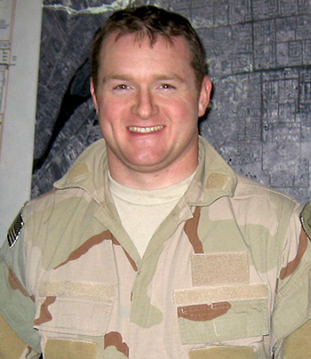 US Navy SEAL Joseph "Clark" Schwedler smiling in uniform