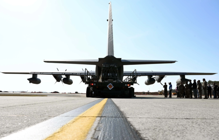 Rear of a Lockheed MC-130J parked on a runway