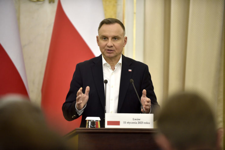 Andrzej Duda speaking at a podium