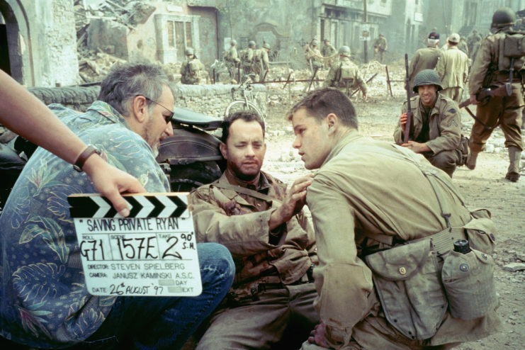 Steven Spielberg talking with Tom Hanks and Matt Damon