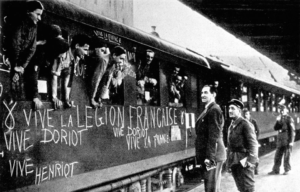 Légion des volontaires français contre le bolchevisme leaning out of the windows of a departing train