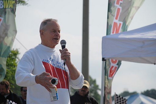 Rudy Boesch speaking into a microphone