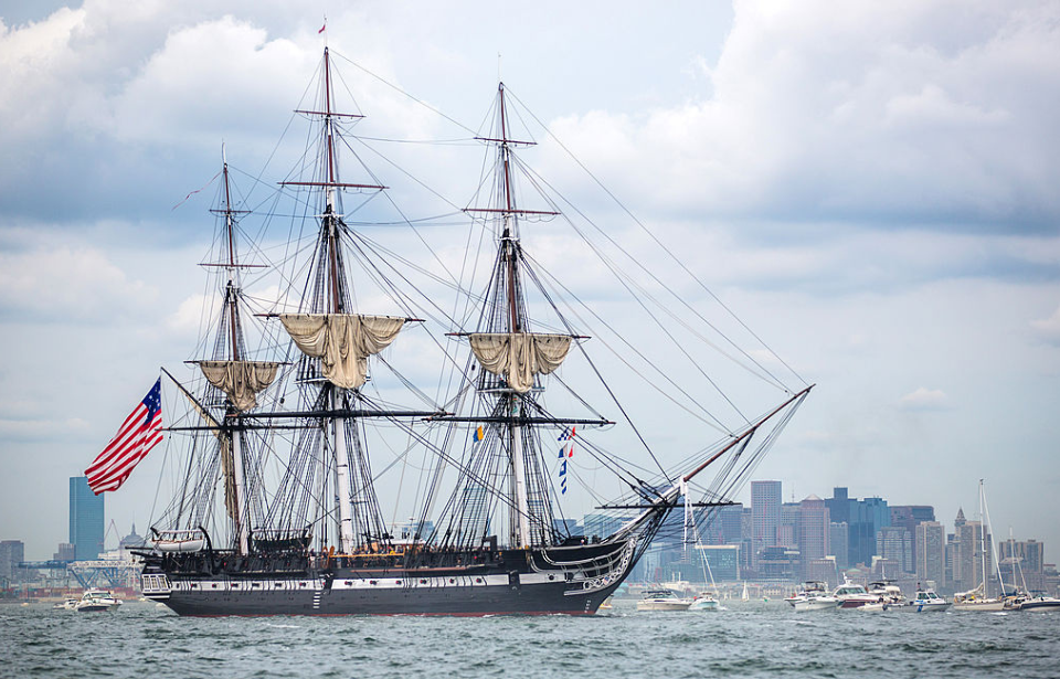 USS Constitution sailing through Boston Harbor