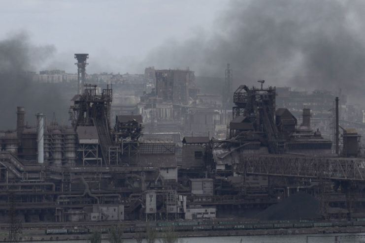 Smoke rising over the remains of Azovstal Iron and Steel Works