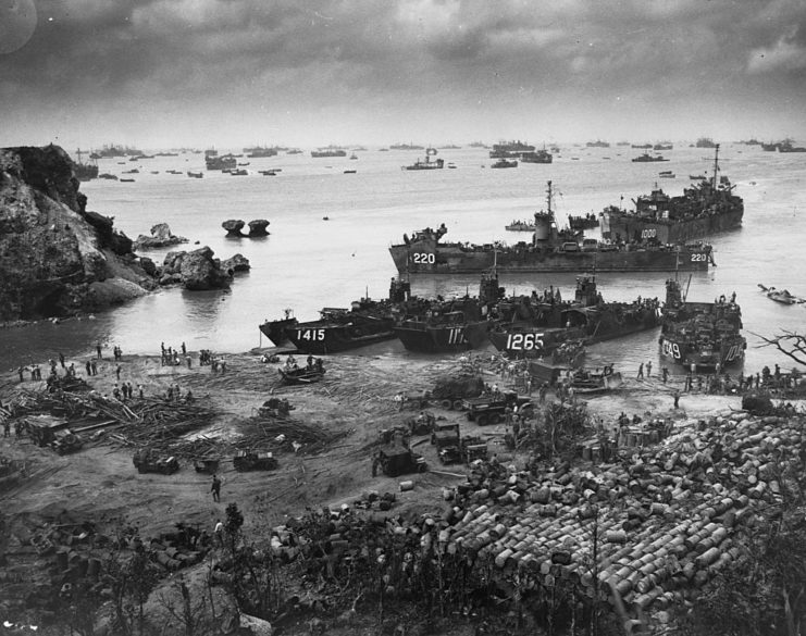 US Navy sailors and vessels gathered along the coast of Okinawa