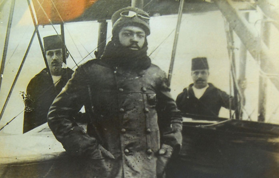 Ahmet Ali Çelikten standing in his pilot's uniform