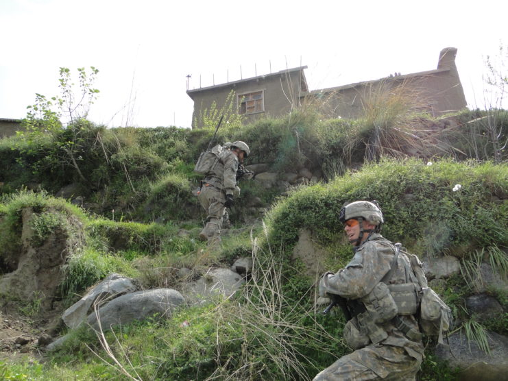 Armando Avalose and Andrew Bundermann walking up a mountainside