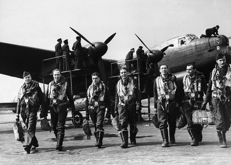 Avro Lancaster crew walking away from their aircraft
