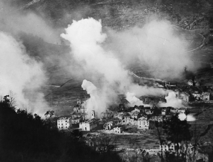 Italian village shrouded in smoke and flames