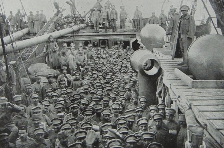 Portuguese soldiers crammed onto the deck of a ship