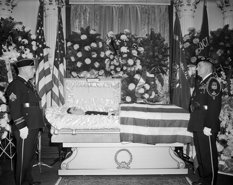 Two American Legion Honor Guard members standing near Pvt. Leslie Coffelt's coffin