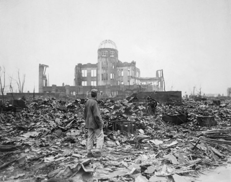 Man standing among the ruins of the Museum of Science and Industry