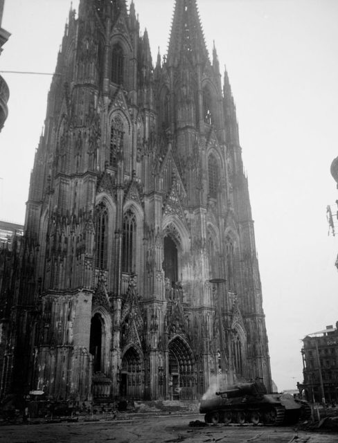 Burning German tank in front of Cologne's cathedral