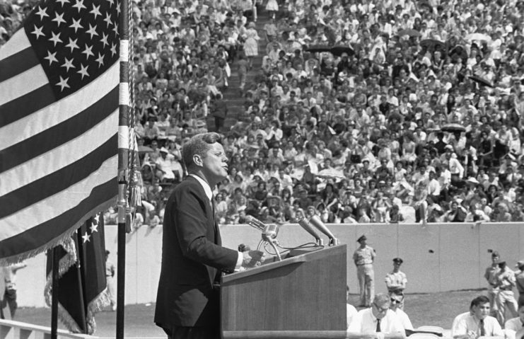 John F. Kennedy speaking in front of a large crowd