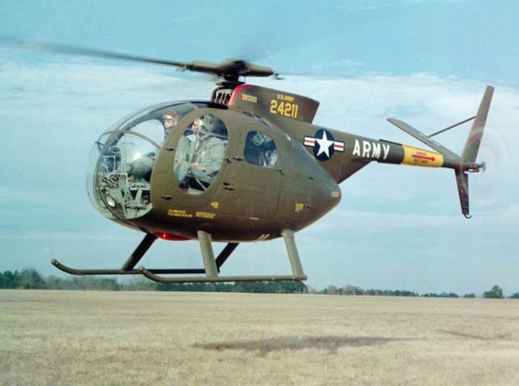 Hughes YOH-6A Cayuse prototype hovering over a field