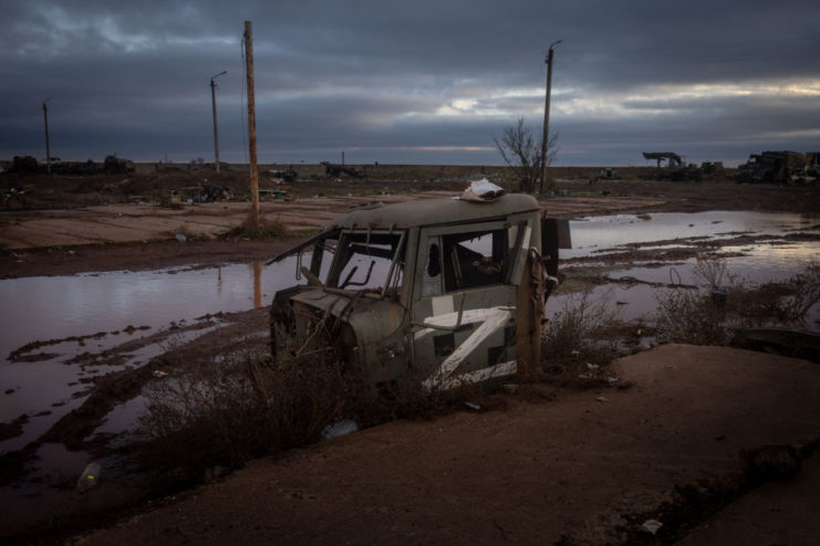 Damaged Russian vehicle abandoned along a street in Kherson