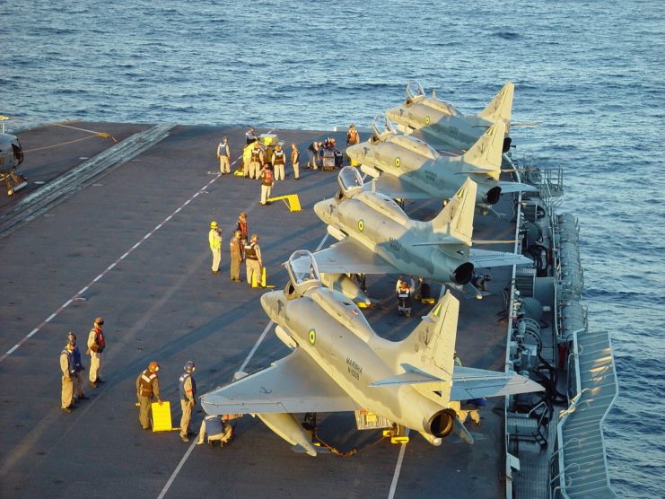 Four Douglas AF-1 Skyhawks parked on the flight deck of the NAe São Paulo