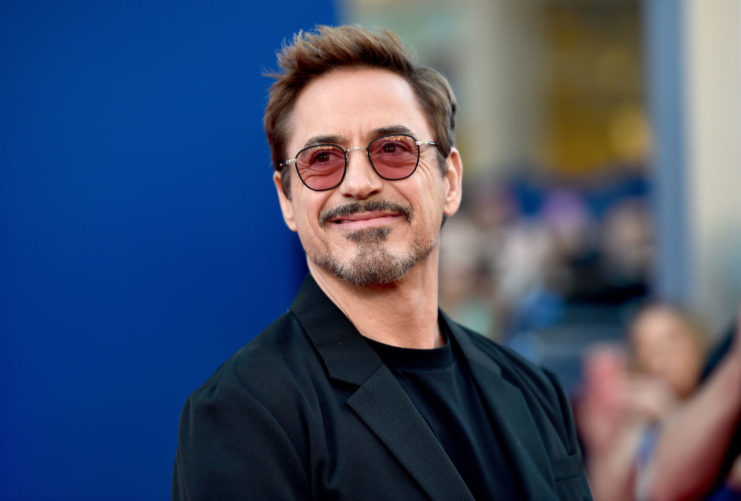 Robert Downey Jr. posing on a red carpet