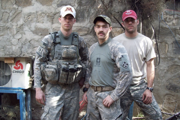 Andrew Bundermann, Clinton L. Romesha and Brad Larson standing together