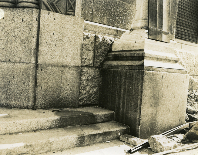 Human shadow on the steps at the entrance to the Hiroshima branch of Sumitomo Bank