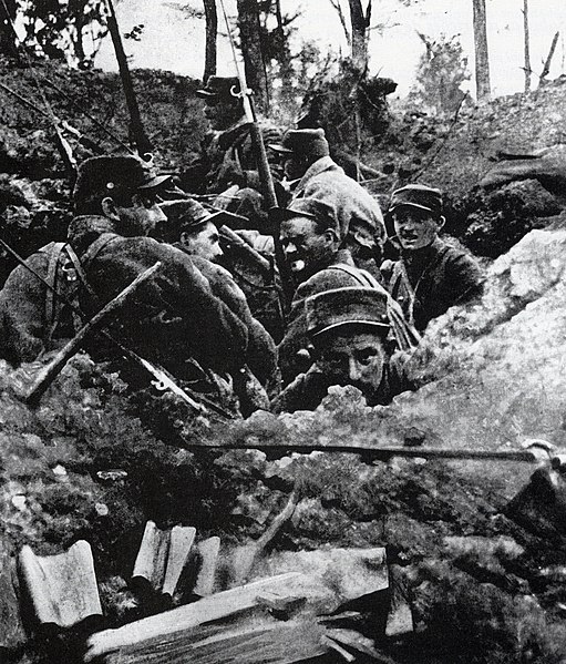 Portuguese soldiers gathered together in a trench