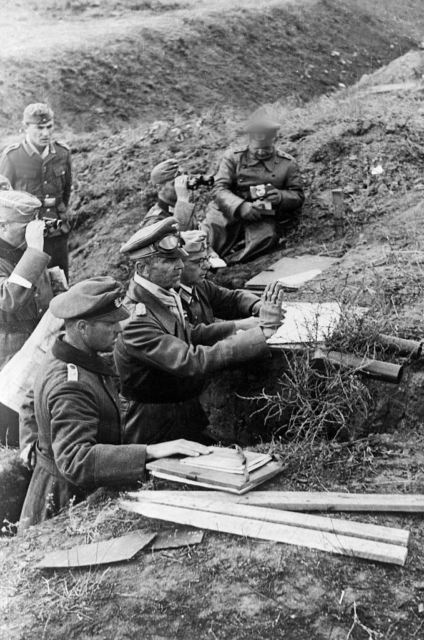 Friedrich Paulus standing in a trench with other German officers