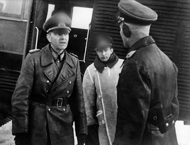Friedrich Paulus standing with two other German officers