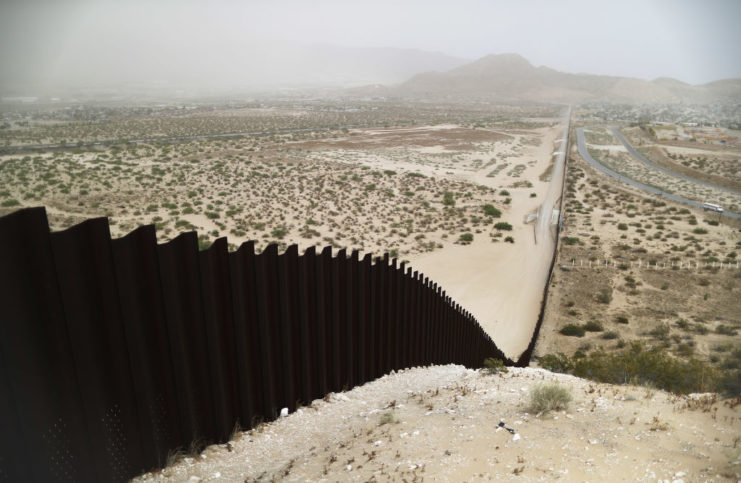 Border wall running between the United States and Mexico