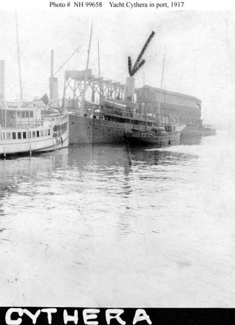 USS Cythera (SP-575) anchored at a dock